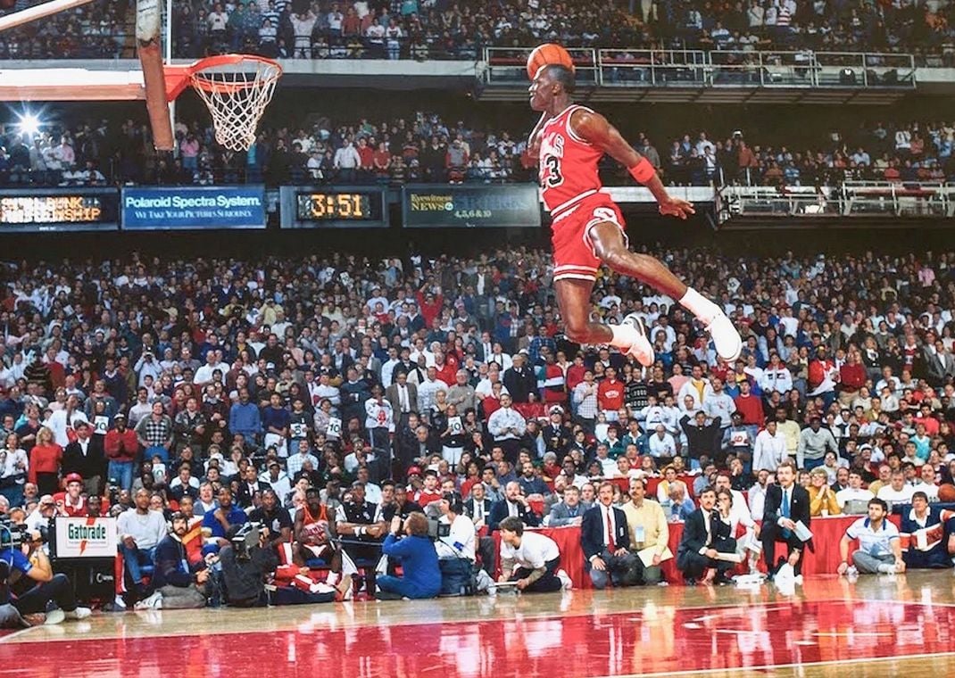 Michael Jordan Wearing the Air Jordan 3 White Cement in the 1988 NBA Slam Dunk Contest