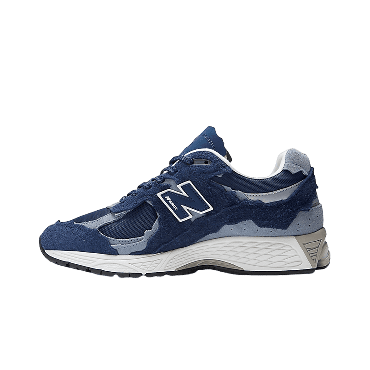 New Balance 2002R Protection Pack Navy Grey Angle 0