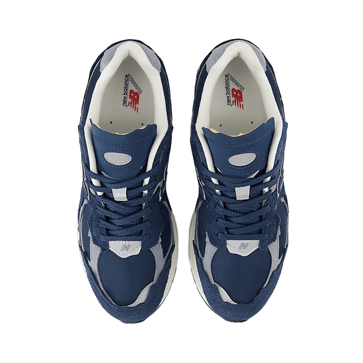 New Balance 2002R Protection Pack Navy Grey Angle 1