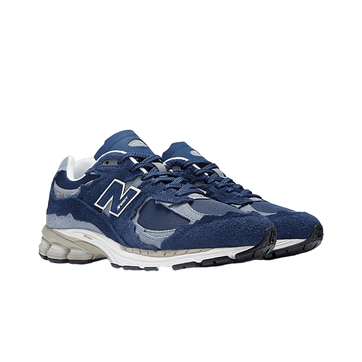 New Balance 2002R Protection Pack Navy Grey Angle 2