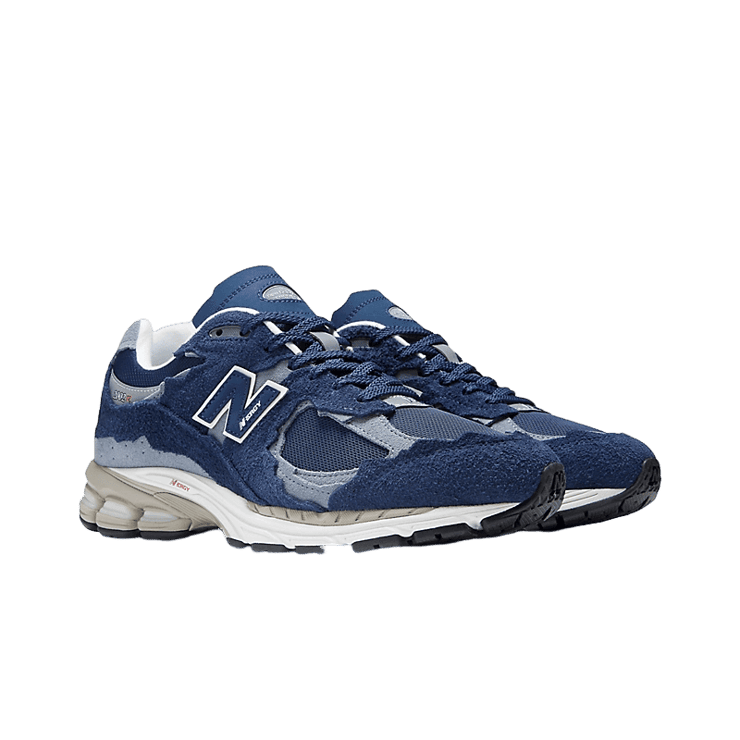 New Balance 2002R Protection Pack Navy Grey Angle 2