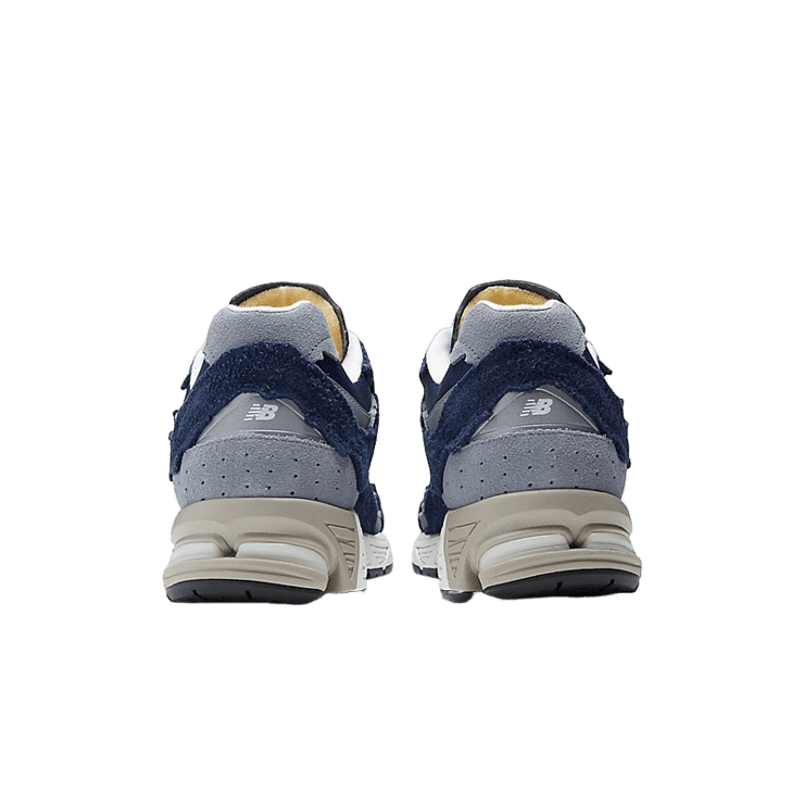 New Balance 2002R Protection Pack Navy Grey Angle 4