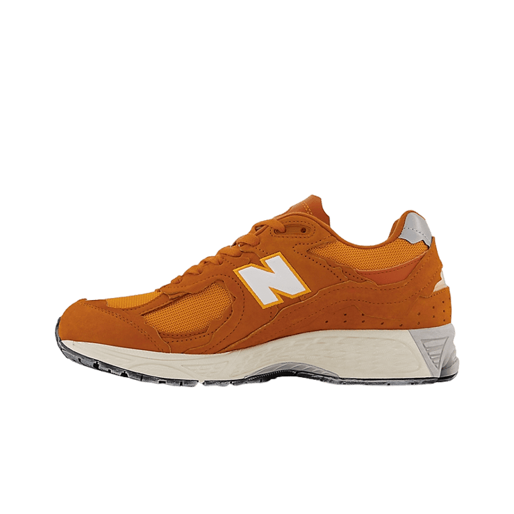 New Balance 2002R Protection Pack Orange Angle 0