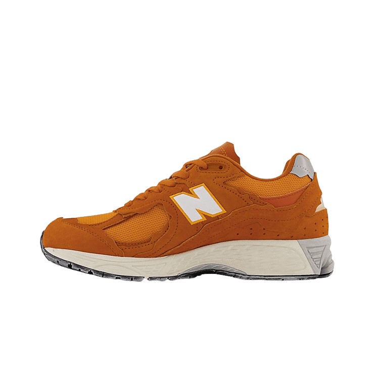 New Balance 2002R Protection Pack Orange Angle 0