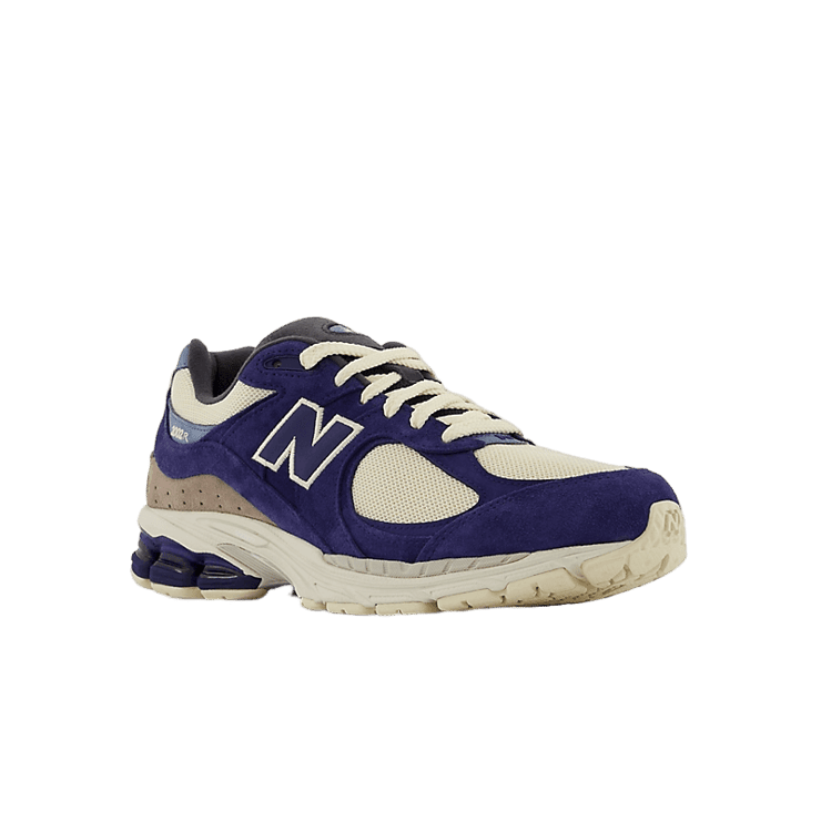 New Balance 2002R Light Cream Purple Angle 2