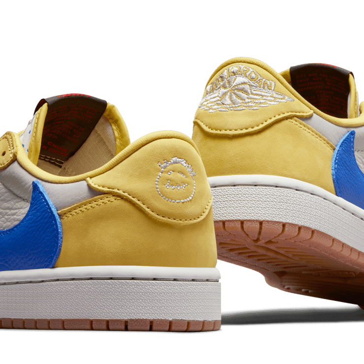Air Jordan 1 Retro Low OG Travis Scott Canary (W) Angle 1