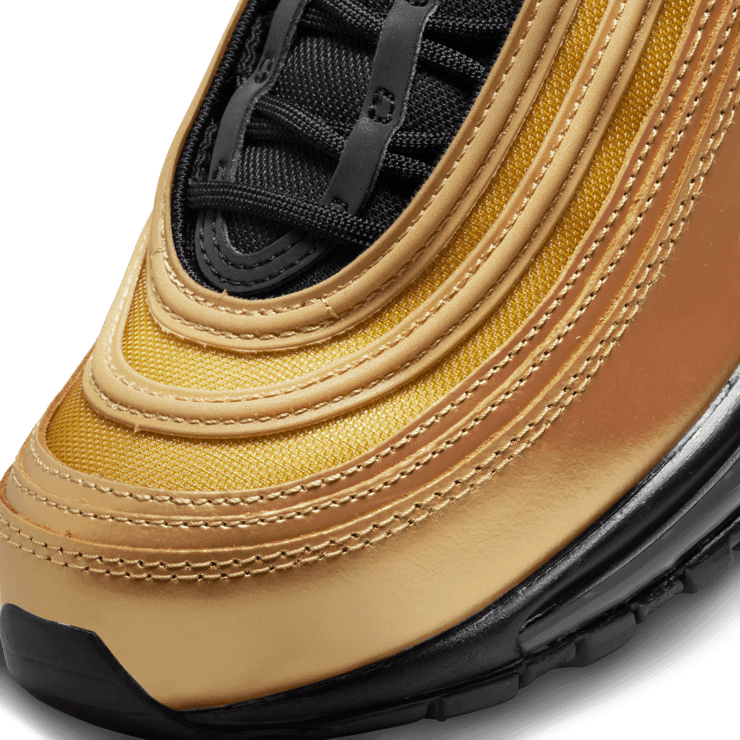 Black and gold nike 97 deals