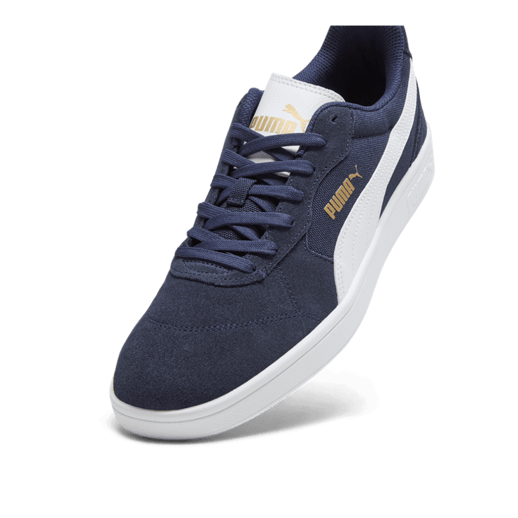 PUMA Astro Play Sneakers in Dark Blue Angle 2