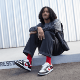 Nike Dunk Low Red Swoosh Panda Angle 0