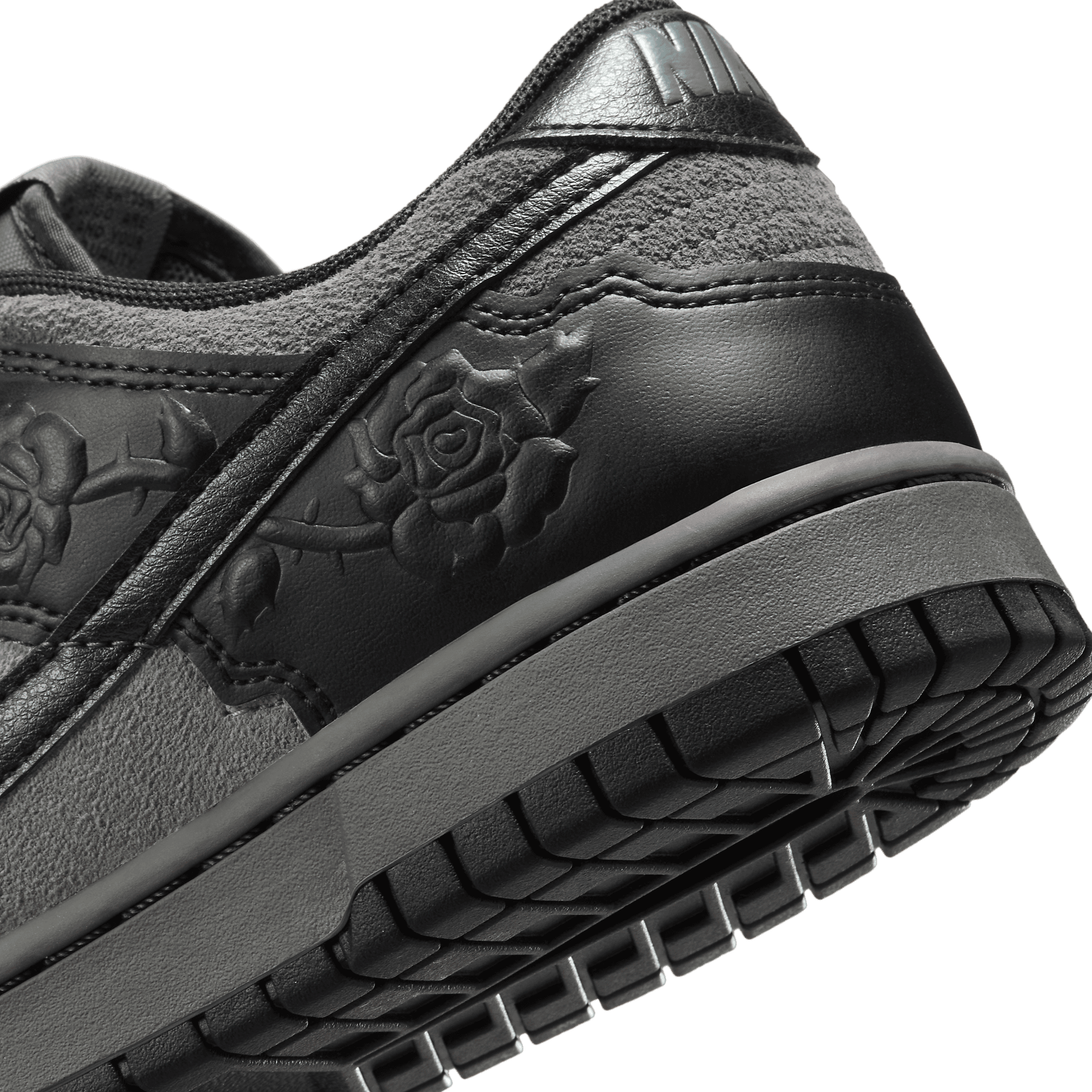 black nikes with roses