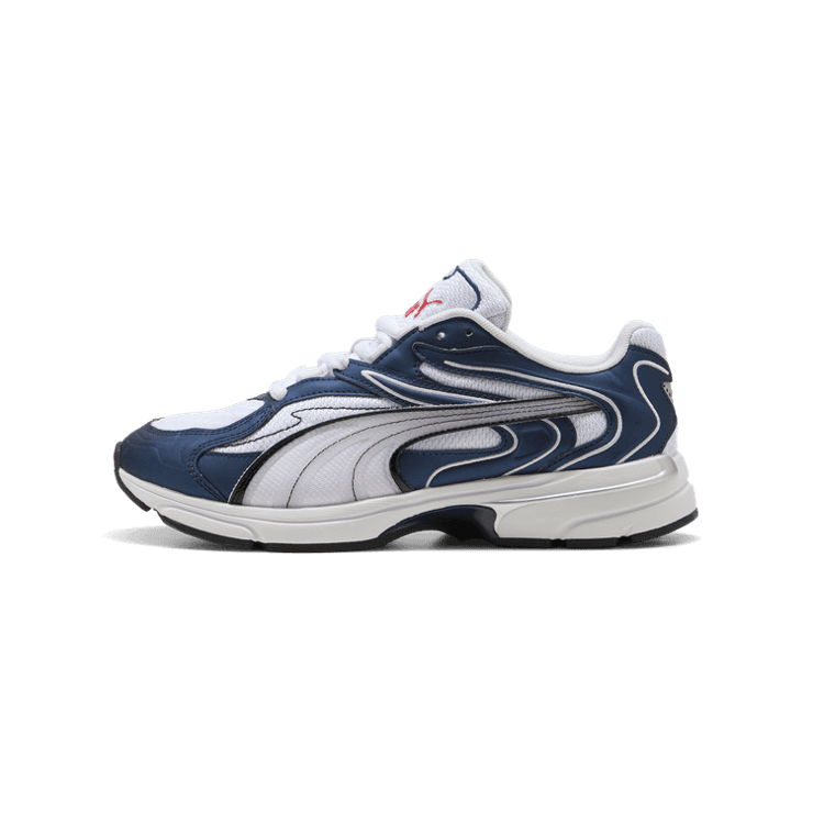 PUMA Extos Millennium Sneakers in Dark Blue Angle 1