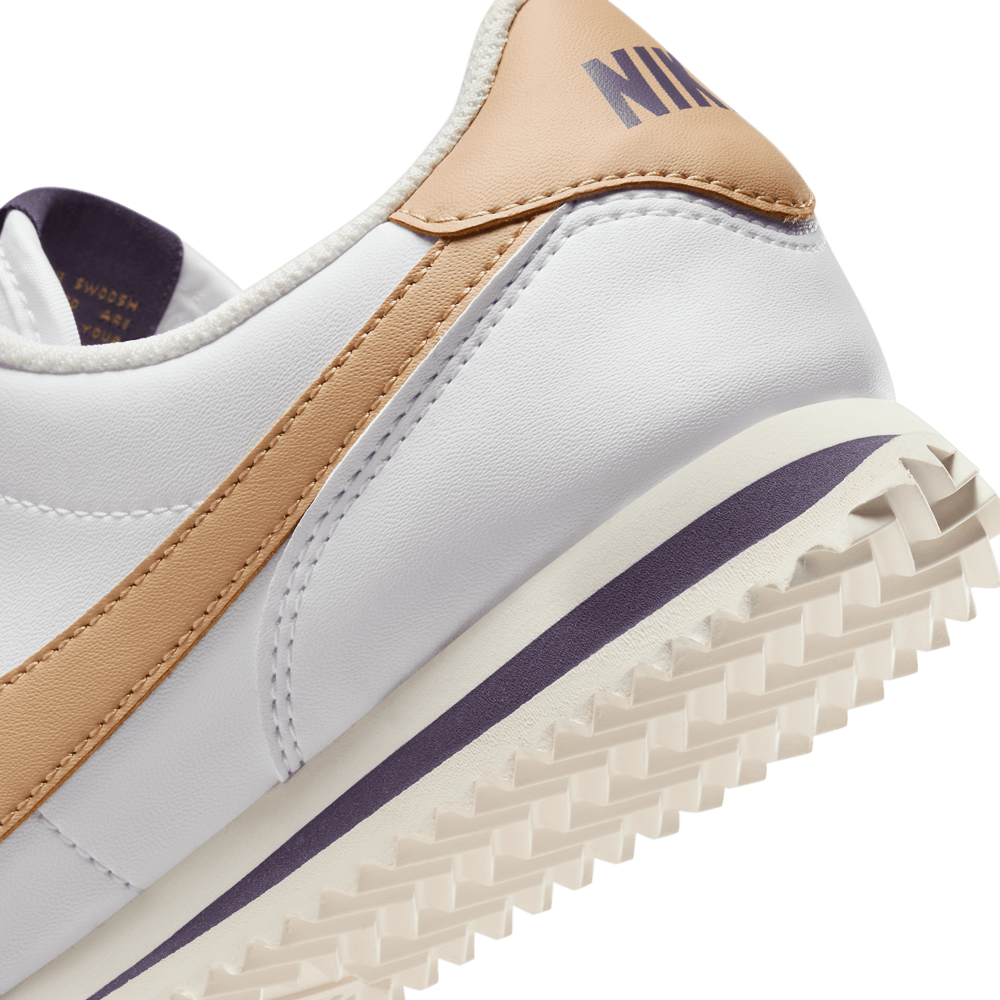 white and gold cortez womens