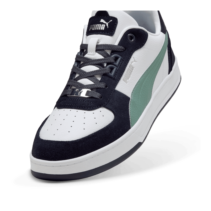 PUMA Caven 2.0 Lux SD Sneakers in Dark Blue Angle 3