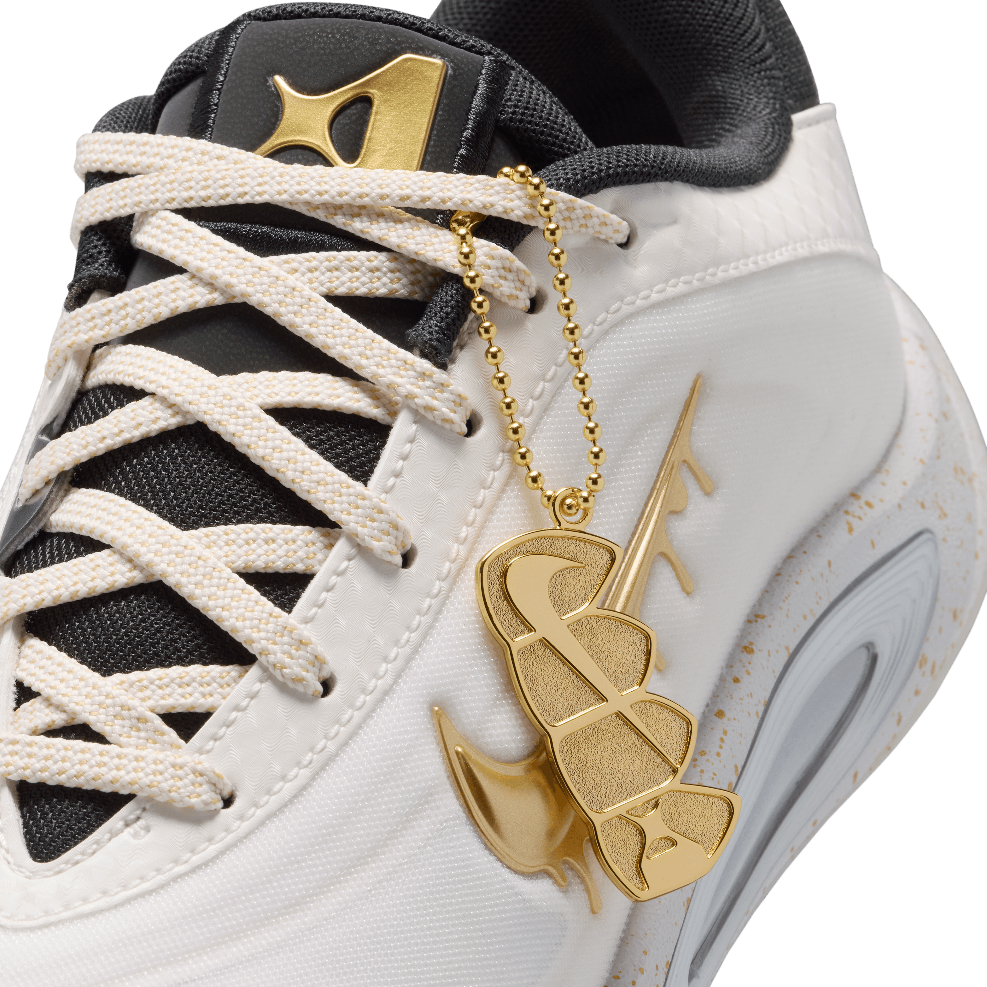 white nike basketball shoes with gold swoosh