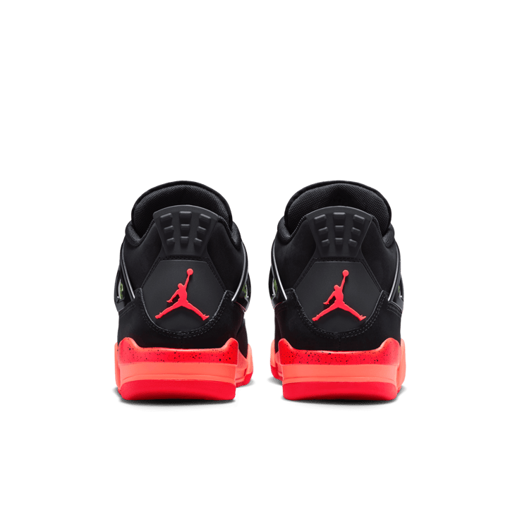 Air Jordan 4 Retro Black Infrared 23 GS outsole showing Bright Mango and Infrared 23 speckled sole unit