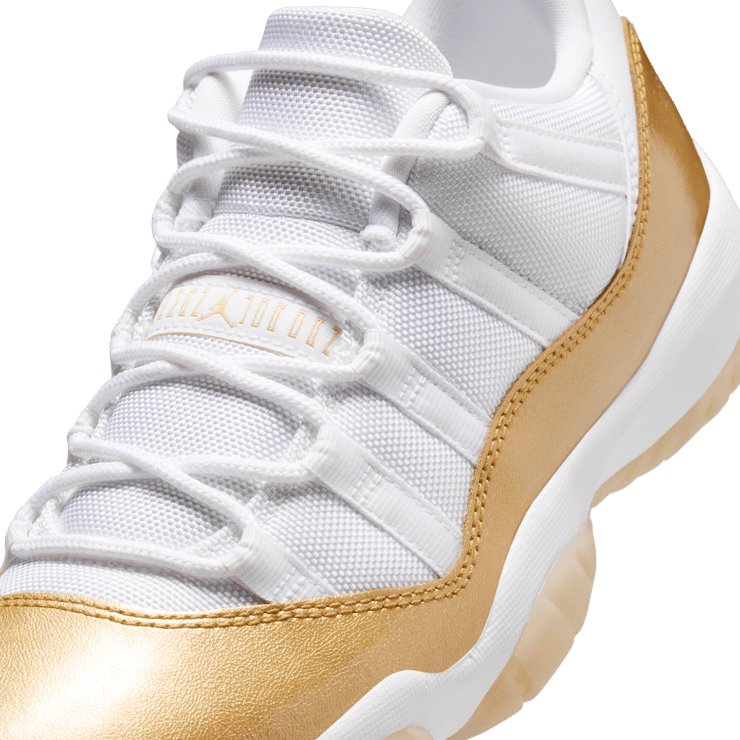 Air Jordan 11 Low Mother's Day top down view showing white mesh upper gold Jumpman midfoot branding and thick laces