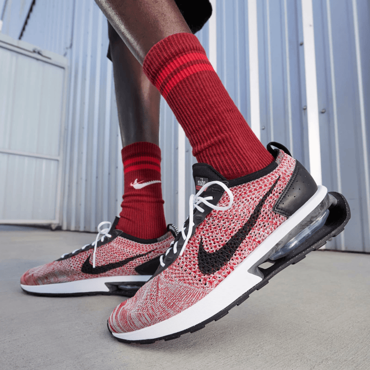 Nike Air Max Flyknit Racer Next Nature University Red Wolf Grey Angle 0